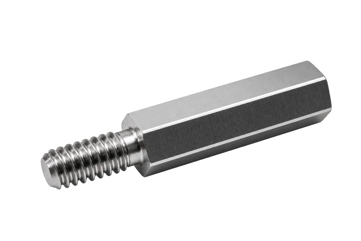 외부 나사산과 육각 몸체가 있는 은색 정밀가공 스페이서 · Machined hex standoff